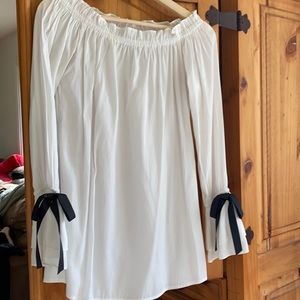 White mini dress with black bows